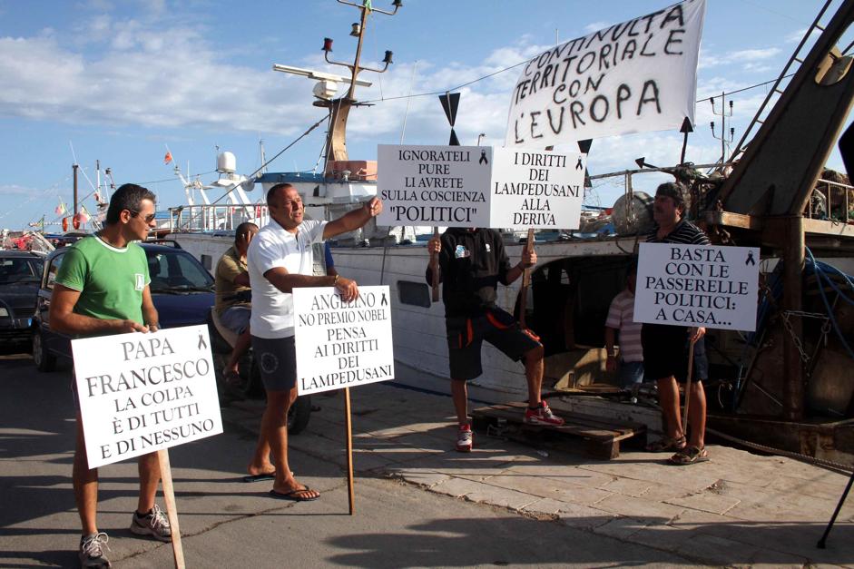 Баррозу на Лампедузе встретили словами «Убийцы!»