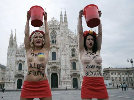 Активистки Femen устроили акцию против Путина перед саммитом АСЕМ