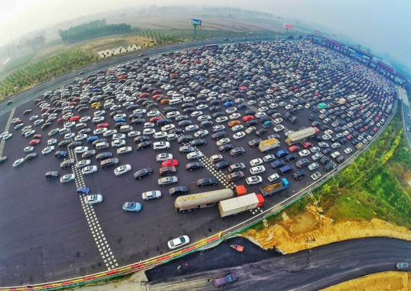 BEIJING, CHINA - OCTOBER 06: (CHINA OUT) .Travel Peak Appears On Beijing-Hong Kong-Macau Expressway At End Of Chinas National Day Holiday..Aerial view of cars queuing up to pass a checkpoint set recently in the direction of Beijing on the Beijing-Hong Kong-Macau Expressway at the end of National Day Holiday on October 6, 2015 in Beijing, China. A travel peak appeared at the end of 7-day China's National Day Holiday. .Â©Whitehotpix (Credit Image: © Whitehotpix via ZUMA Press)
