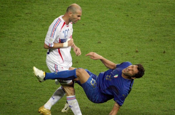 Berlin, GERMANY: A photo taken 09 July 2006 shows French midfielder Zinedine Zidane (L) gesturing after head-butting Italian defender Marco Materazzi during the World Cup 2006 final football match between Italy and France at Berlin?s Olympic Stadium. AFP PHOTO JOHN MACDOUGALL (Photo credit should read JOHN MACDOUGALL/AFP/Getty Images)