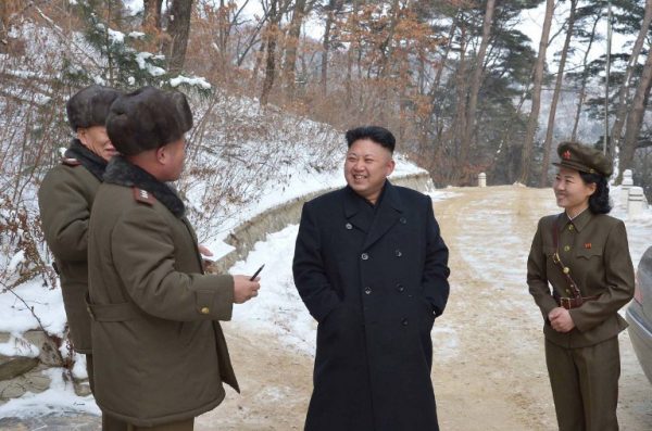 This undated picture, released from North Korea's official Korean Central News Agency (KCNA) on January 23, 2014 shows North Korean leader Kim Jong-Un (C) visiting the revolutionary battle site at Mt. Madu in Anju in South Pyongan province. AFP PHOTO / KCNA via KNS REPUBLIC OF KOREA OUT THIS PICTURE WAS MADE AVAILABLE BY A THIRD PARTY. AFP CAN NOT INDEPENDENTLY VERIFY THE AUTHENTICITY, LOCATION, DATE AND CONTENT OF THIS IMAGE. THIS PHOTO IS DISTRIBUTED EXACTLY AS RECEIVED BY AFP. ---EDITORS NOTE--- RESTRICTED TO EDITORIAL USE - MANDATORY CREDIT "AFP PHOTO / KCNA VIA KNS" - NO MARKETING NO ADVERTISING CAMPAIGNS - DISTRIBUTED AS A SERVICE TO CLIENTS