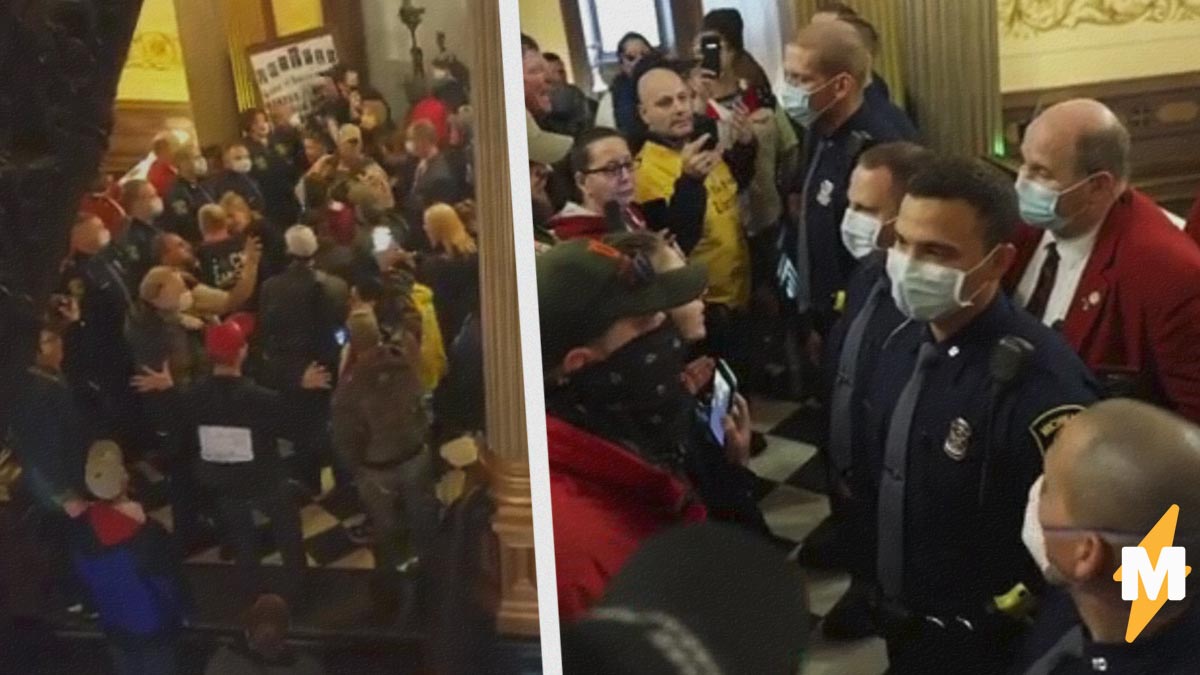 На видео из Мичигана демонстранты с оружием вошли в здание правительства. Они требовали отменить карантин