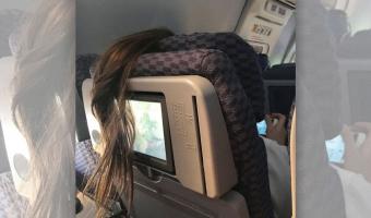 Девушка на видео испортила причёску соседки в самолёте. Но о такой мести за нарушение комфорта много спорят