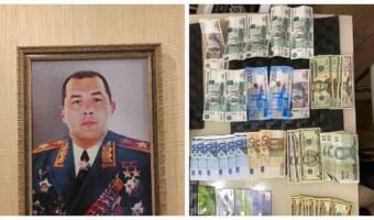 Дома у сотрудника ГИБДД из Ростова нашли его портрет со звёздами Героя СССР и пачки денег