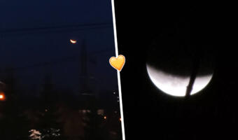 Как россияне встретили редкое лунное затмение. На фото кровавая Луна зловеще нависает над домами