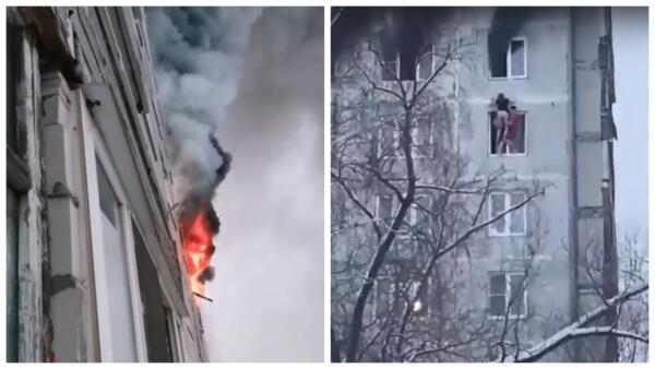 Как москвичи спасались от пожара в многоэтажке. На видео жильцы смело перетащили соседку через окно