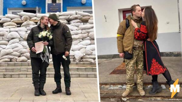 Молодожёны показали свадьбы во время спецоперации в Украине. На фото — невеста в военной форме и фате