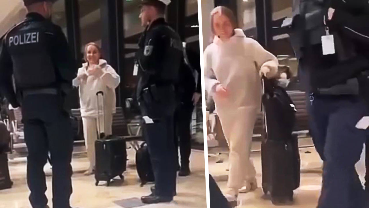 Юлию Прохорову якобы депортировали из Германии. На видео девушка, похожая на неё, улыбается полиции