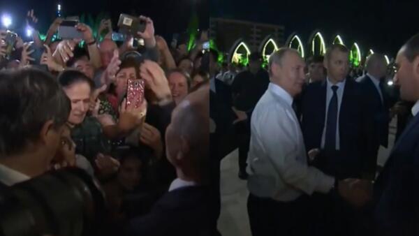 Видео с Путиным в Дербенте запустили теорию о двойнике главы РФ. На них он тянет руки толпе