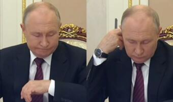 На видео Путин ищет часы на левой руке вместо правой. Кадры вновь породили теорию о двойнике